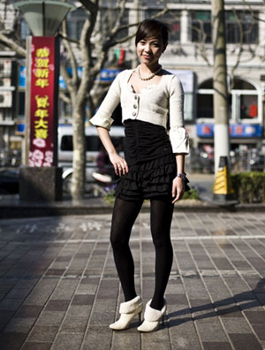 及膝靴时尚搭配 万般皆能